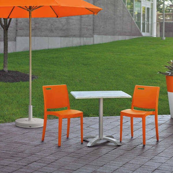 Grosfillex US563019 / US653019 Metro Orange Indoor / Outdoor Stacking
