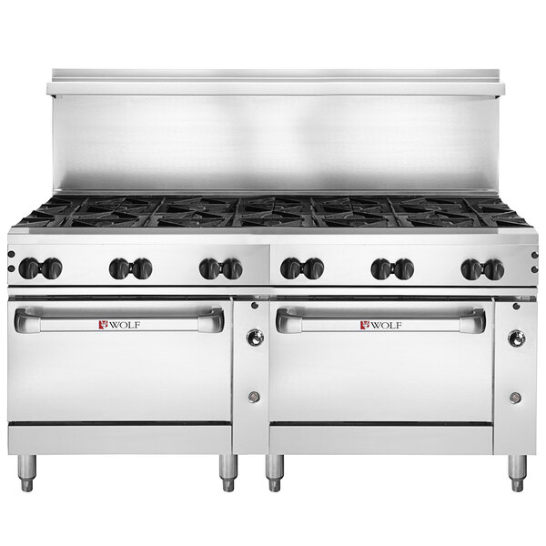 A large stainless steel Wolf commercial gas range with two standard ovens and 12 burners.