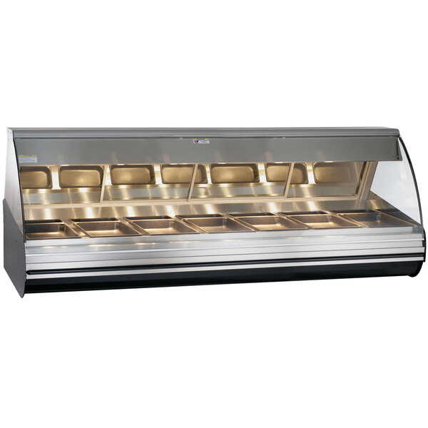 A stainless steel Alto-Shaam countertop heated display case with curved glass.