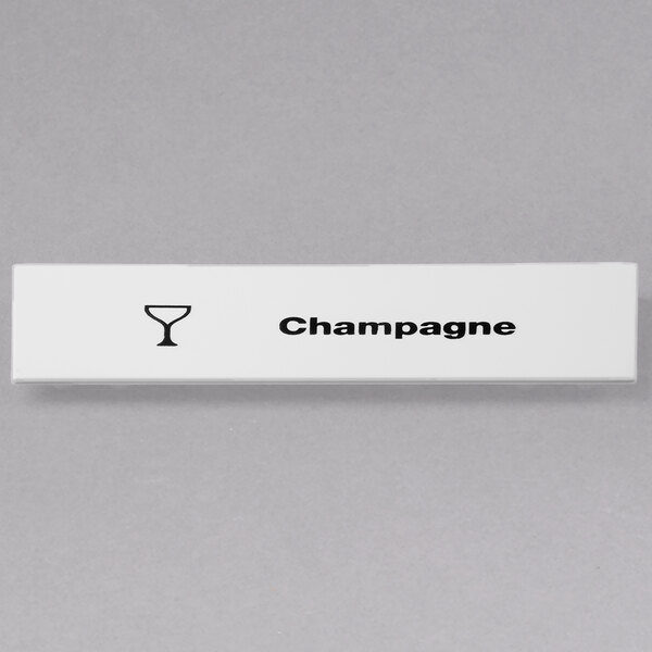 A white rectangular Cambro ID clip with black text reading "champagne" on it.