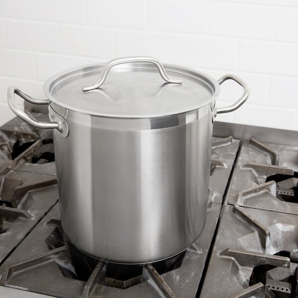 A large silver Vollrath stock pot on a stove.