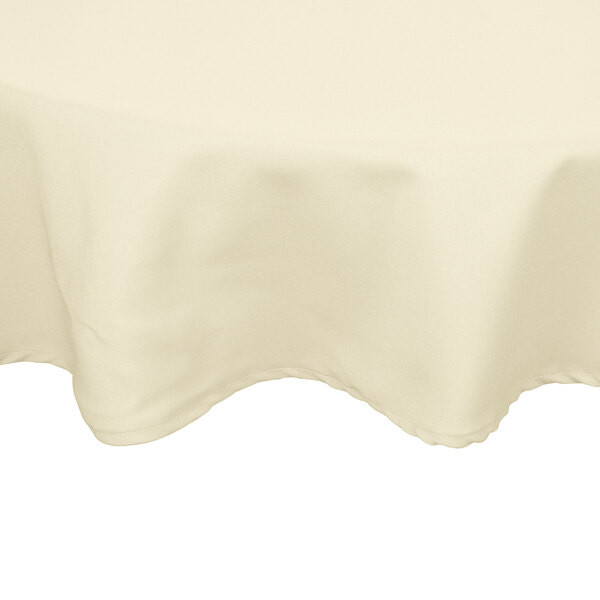 An ivory tablecloth with a white border.