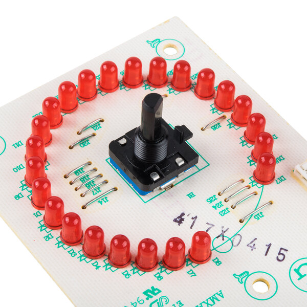 A Solwave PCB board with a switch and red lights.
