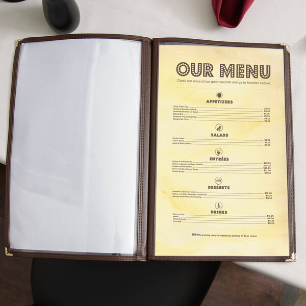 A Mediterranean themed menu on a table in an Italian restaurant.