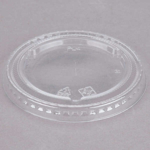 A clear plastic lid with a straw slot.