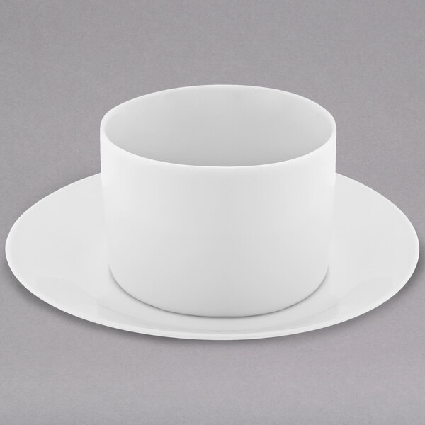 A 10 Strawberry Street Royal White porcelain cup and saucer on a white surface.
