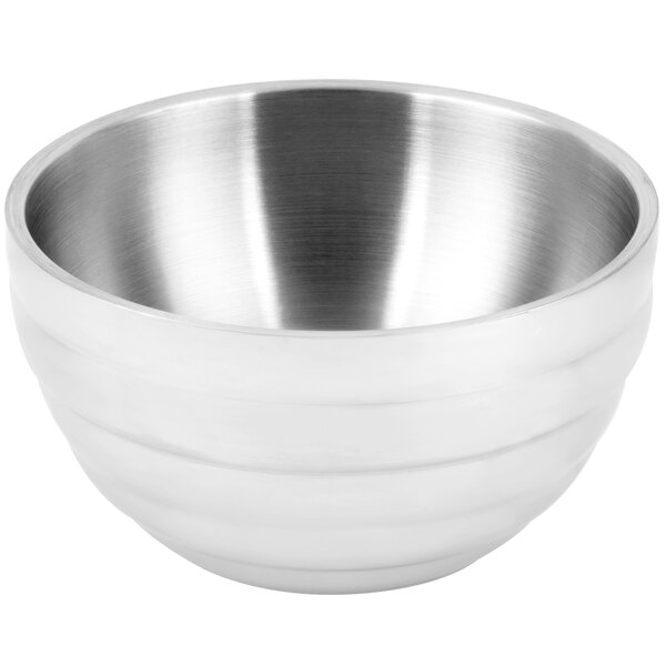 A close-up of a silver Vollrath stainless steel bowl with a white background.