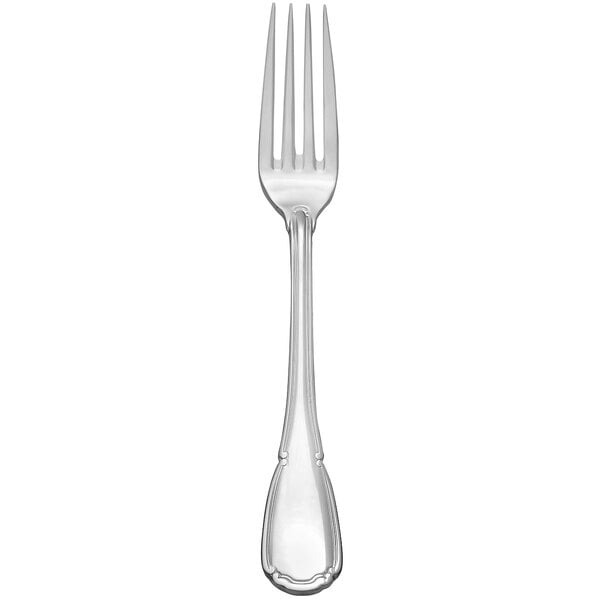 A stainless steel dinner fork with a baroque design on the handle.