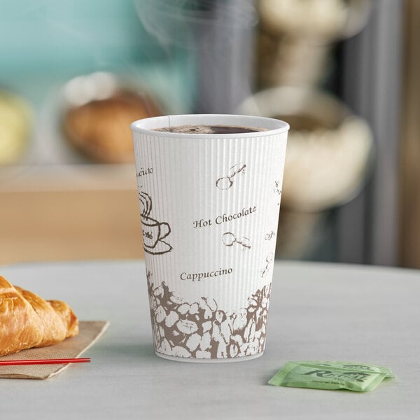 A close-up of a Choice double wall paper hot cup with coffee on a table.