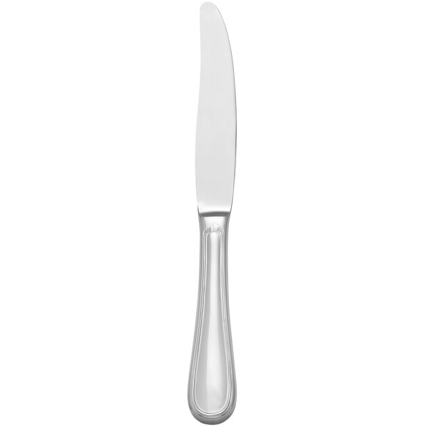 A close-up of a Libbey stainless steel dinner knife with a hollow handle.