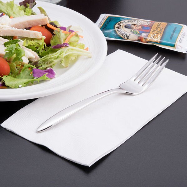 A plate of salad with a Libbey Contempra salad fork.