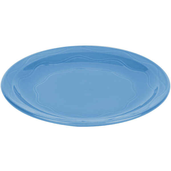 A Libbey blue porcelain plate with a wavy circular design.