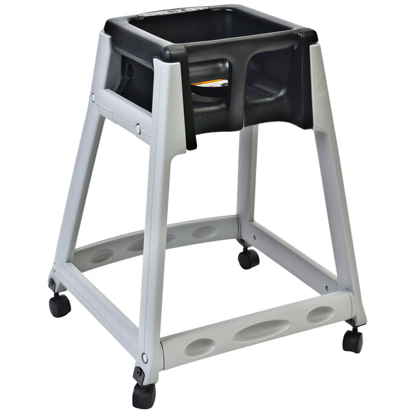 A grey Koala Kare KidSitter high chair with black casters and seat.