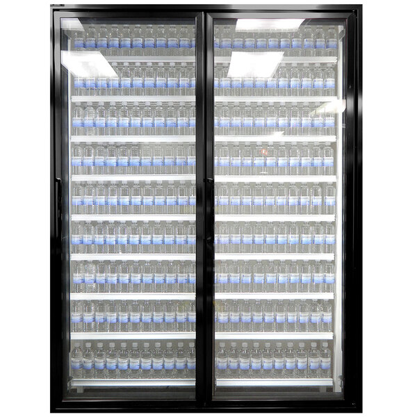 Styleline walk-in cooler doors with shelving filled with water bottles.