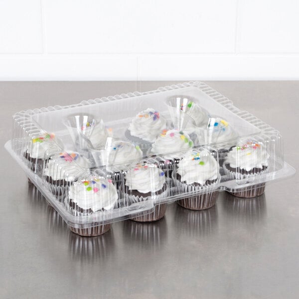 A Polar Pak clear plastic container with cupcakes inside.