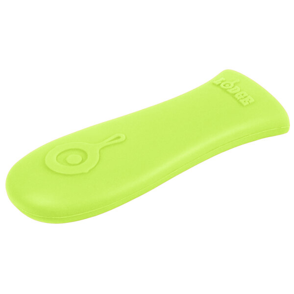 A lime green silicone handle holder with a slit for a handle.