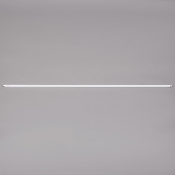 A Satco T5 fluorescent light bulb with white light hanging from a ceiling.