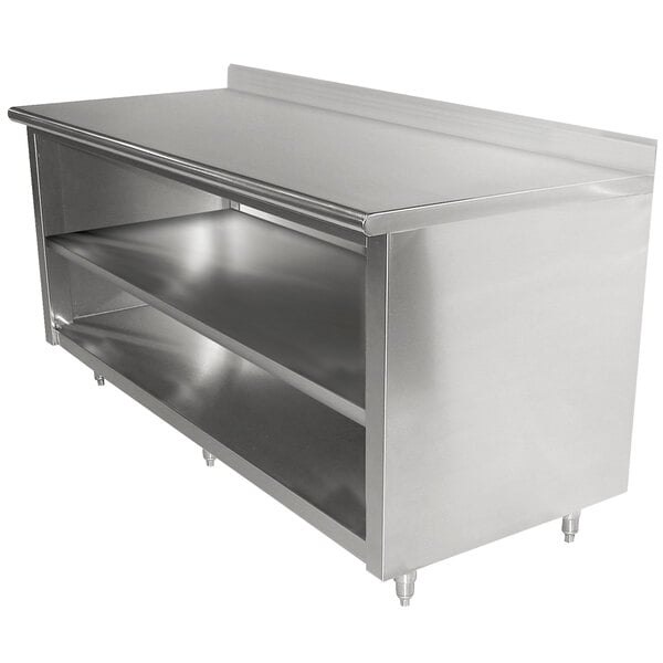 A stainless steel Advance Tabco work table with fixed midshelf and backsplash.