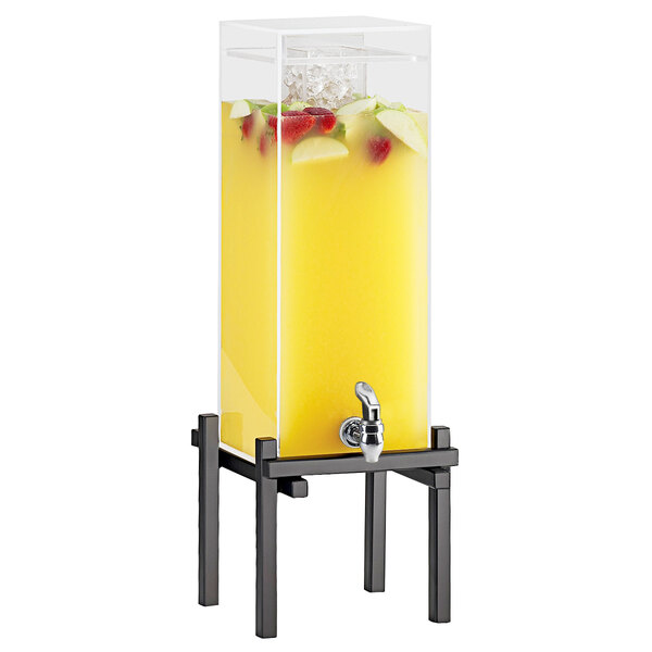 A black Cal-Mil beverage dispenser with fruit in it.