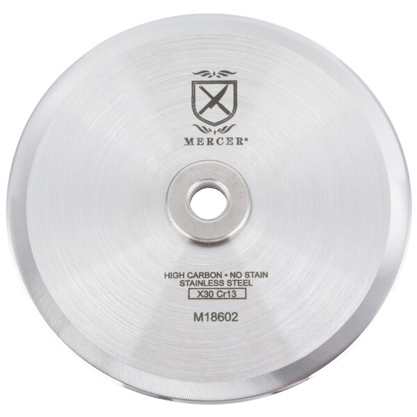 A circular metal disc with the Mercer Culinary logo and a hole.