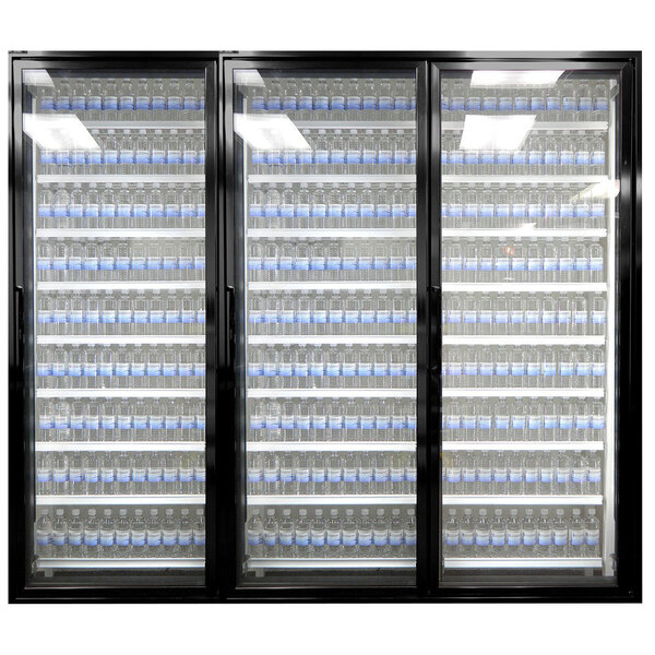 A Styleline walk-in freezer door with glass and shelving holding bottles of water.