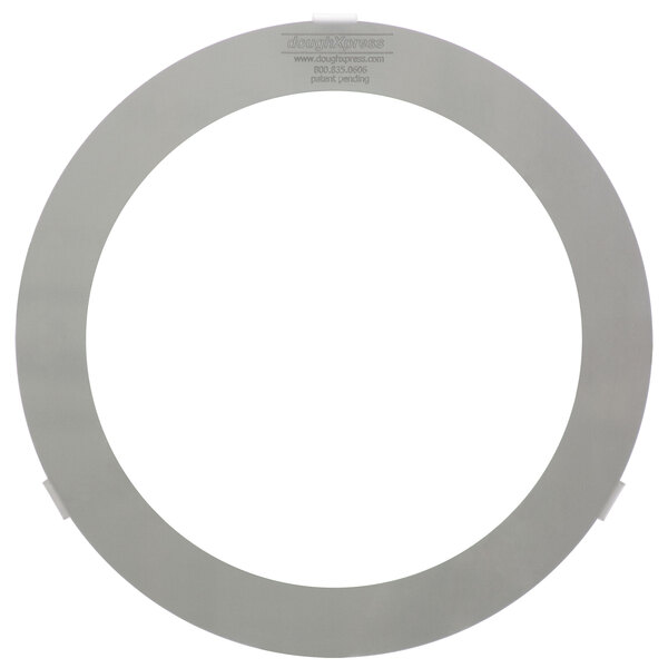 A circular metal plate with a hole in it.