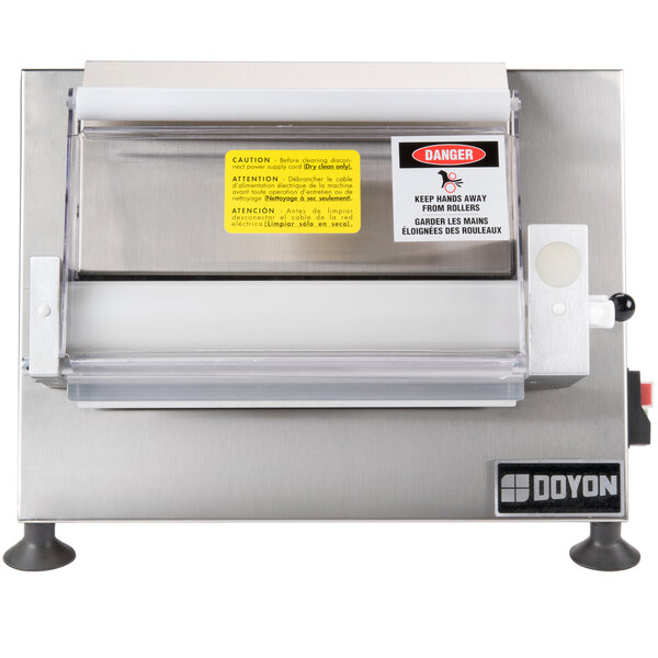 A Doyon DL12SP countertop dough sheeter with a yellow and black label.