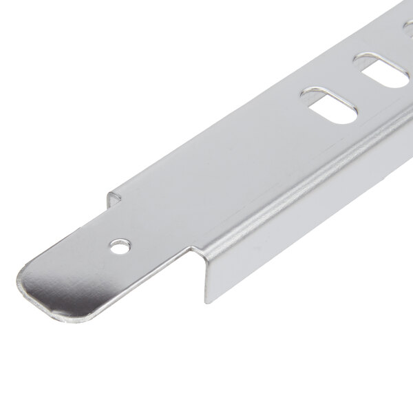 A metal piece with two holes at the top.