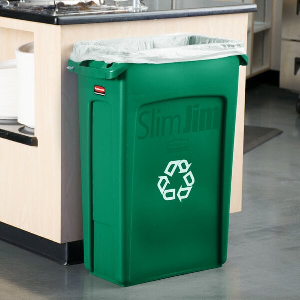 A green Rubbermaid Slim Jim recycling bin with a white recycle logo.