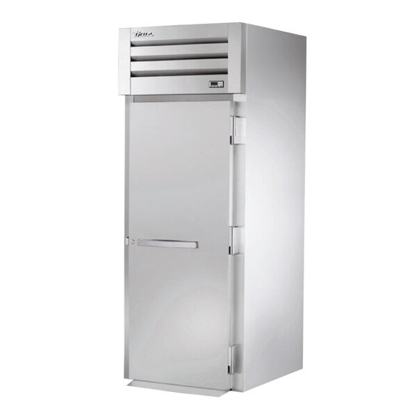 A True stainless steel roll-in heated holding cabinet with a solid door.