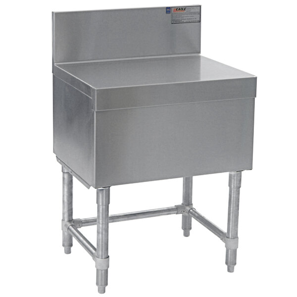 A stainless steel Eagle Group Spec-Bar filler board on a stainless steel counter.