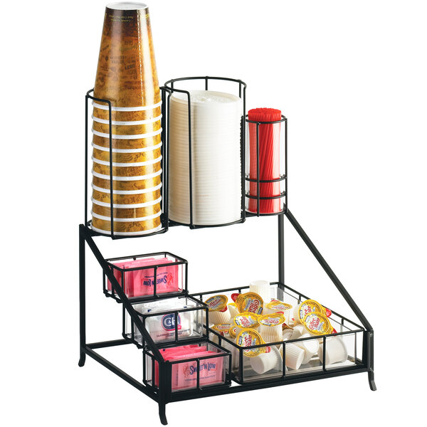 A black metal Cal-Mil coffee condiment display with cups and condiments.