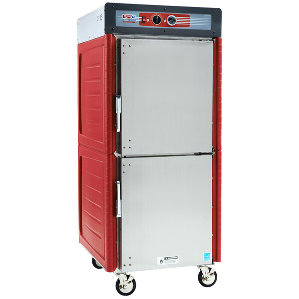 A silver Metro hot holding cabinet with red accents and lip load slides.