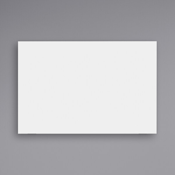 A white rectangular Luxor magnetic glass presentation board with a black border.
