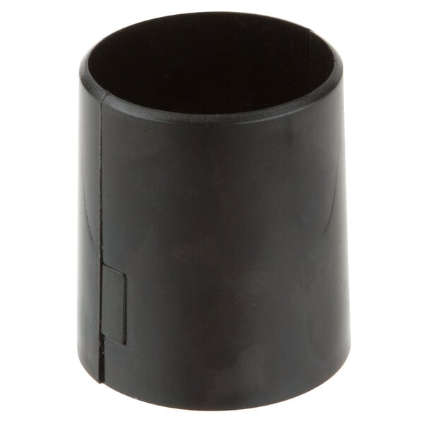 A black cylindrical object with a hole and a black lid.