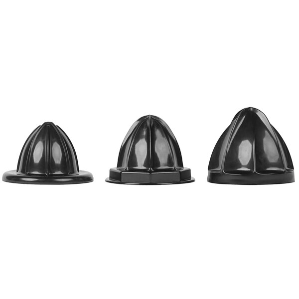 A group of three black plastic juicer reamers with holes.