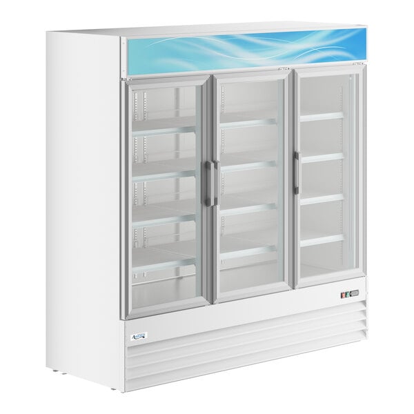 A large white commercial glass door merchandiser refrigerator with three swing doors and interior shelving.