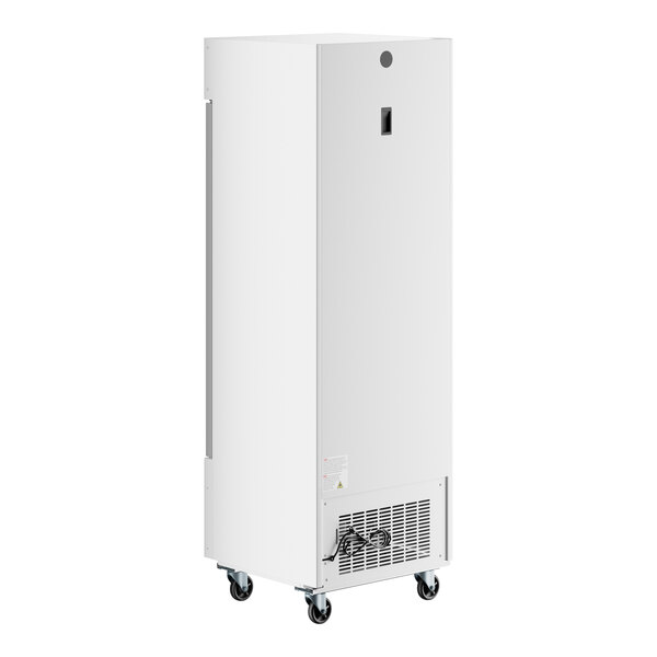 A white customizable swing glass door merchandiser freezer with LED lighting and caster wheels.