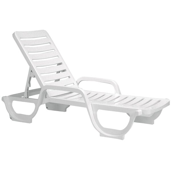 A pair of white plastic Grosfillex chaise lounges with armrests.