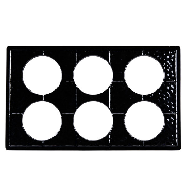 A black tray with six white circles.