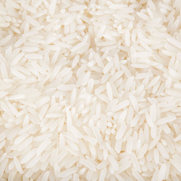 A pile of Regal White Jasmine Rice on a white background.