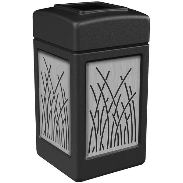 A black and silver rectangular Commercial Zone trash receptacle with a design on it.