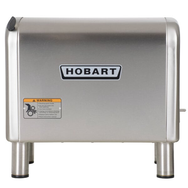 A silver rectangular object with black text reading "Hobart 4822-35 #22 Meat Grinder / Chopper 240/1 - 1 1/2 hp"