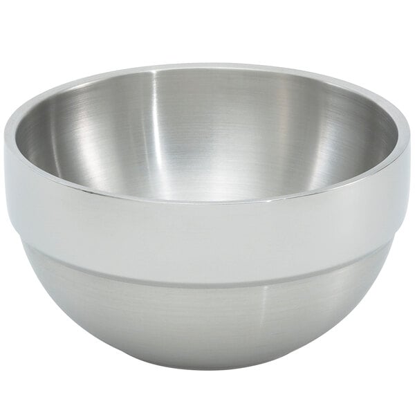 A silver stainless steel Vollrath serving bowl.