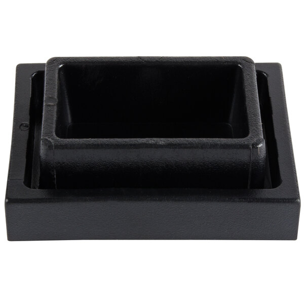 A black rectangular rubber foot for an Avantco mixer.