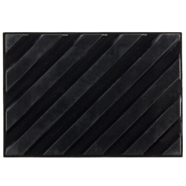 A black rectangular Avantco rubber foot with diagonal lines.