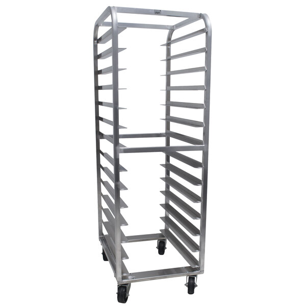 An Advance Tabco aluminum mobile pizza dough box rack with four tiers on wheels.
