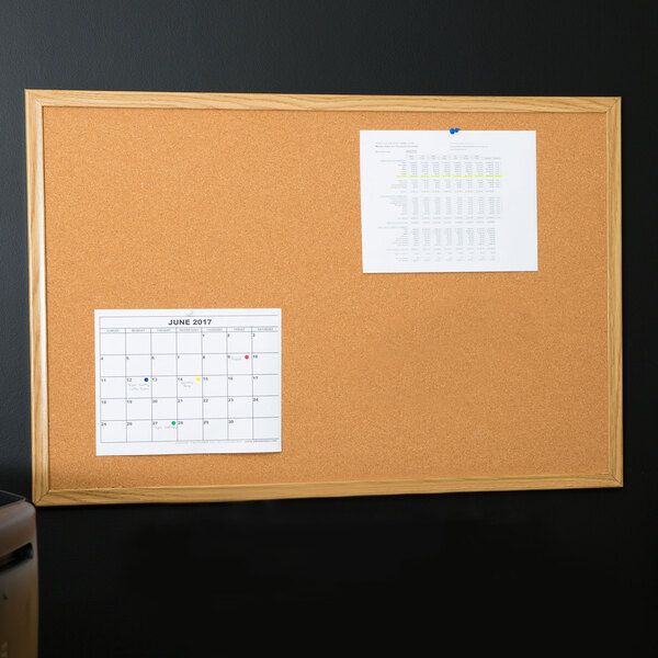 Universal UNV43603 24" x 36" Natural Cork Board with Oak Frame