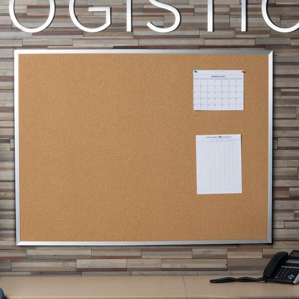 Universal UNV43614 36" x 48" Natural Cork Board with Aluminum Frame
