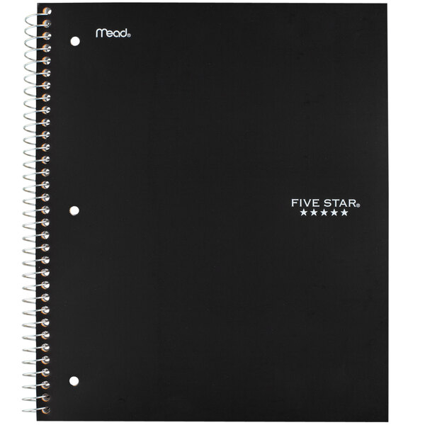 A black Five Star spiral bound notebook with white writing on the cover that says "1 Subject"